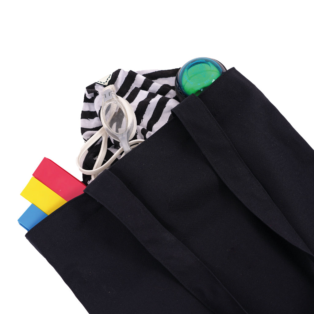 Bolsas Tote Bag Negra con contenido dentro